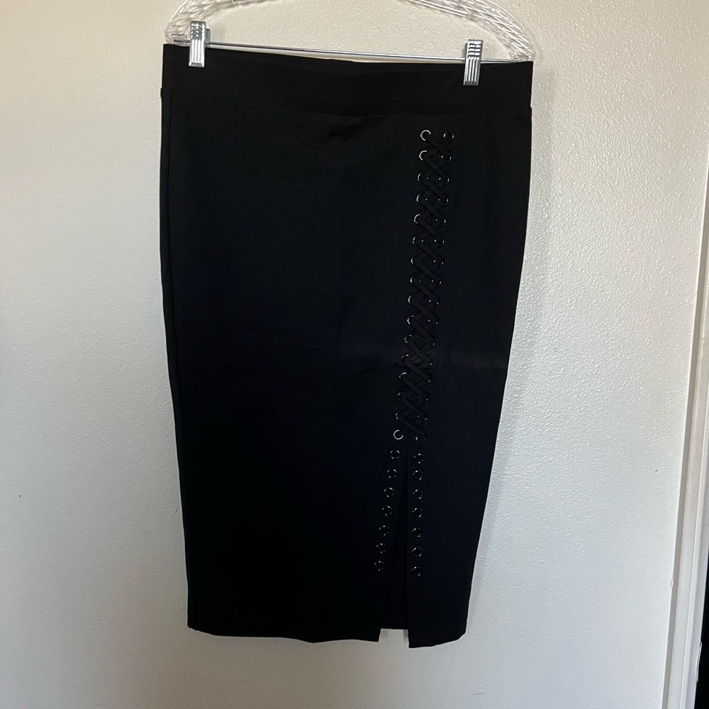 Black pencil lace up skirt, stretchy material.